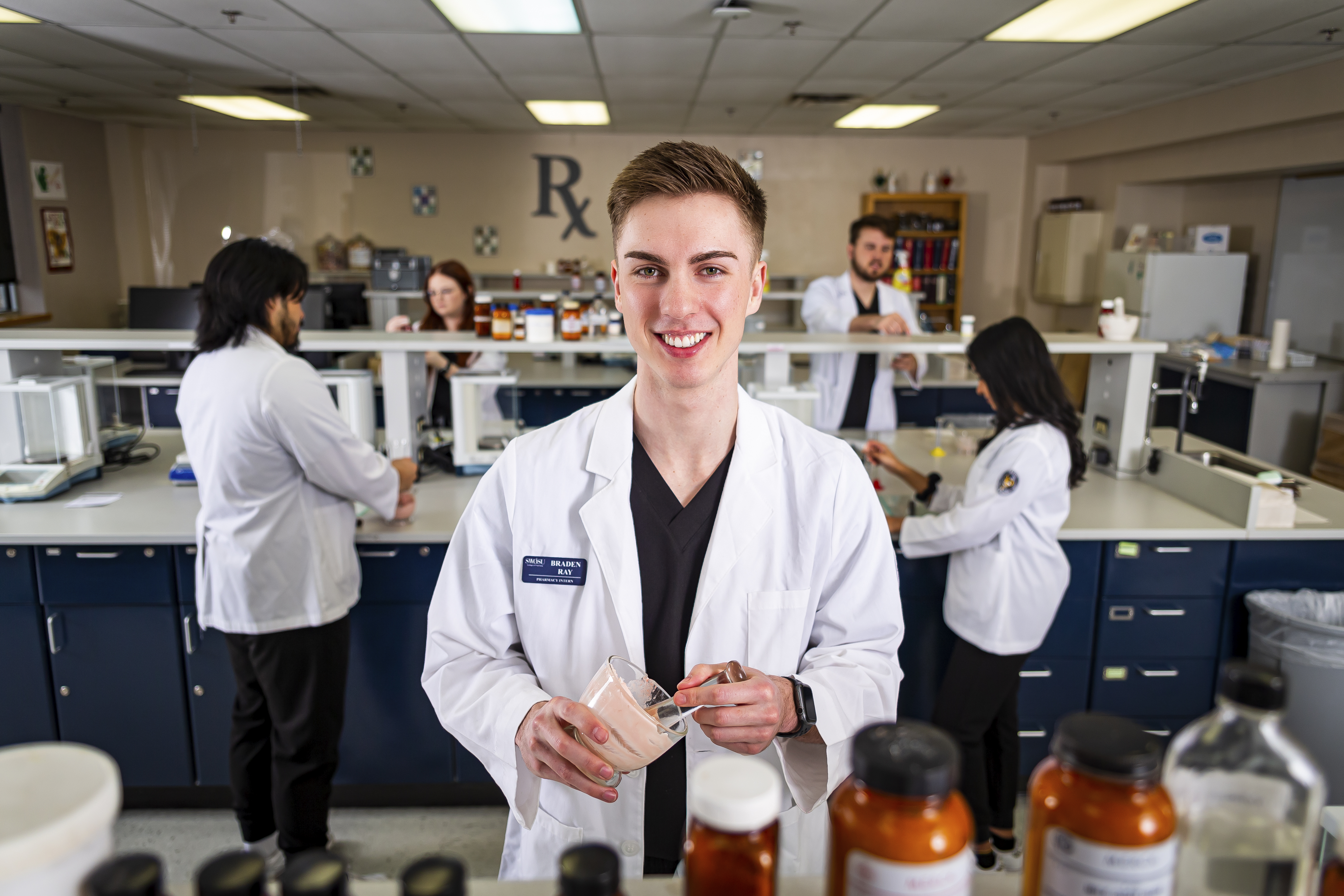 Pharmacy student in lab