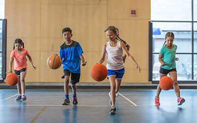 children playing basketball